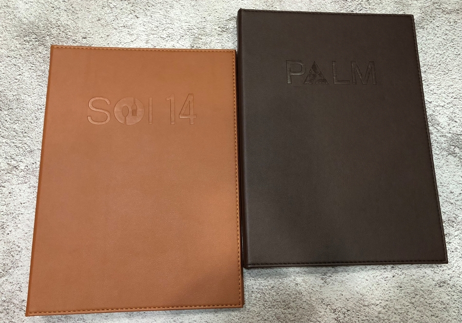Custom leather menu covers tailored to the design concept of restaurants, hotels and resorts.
