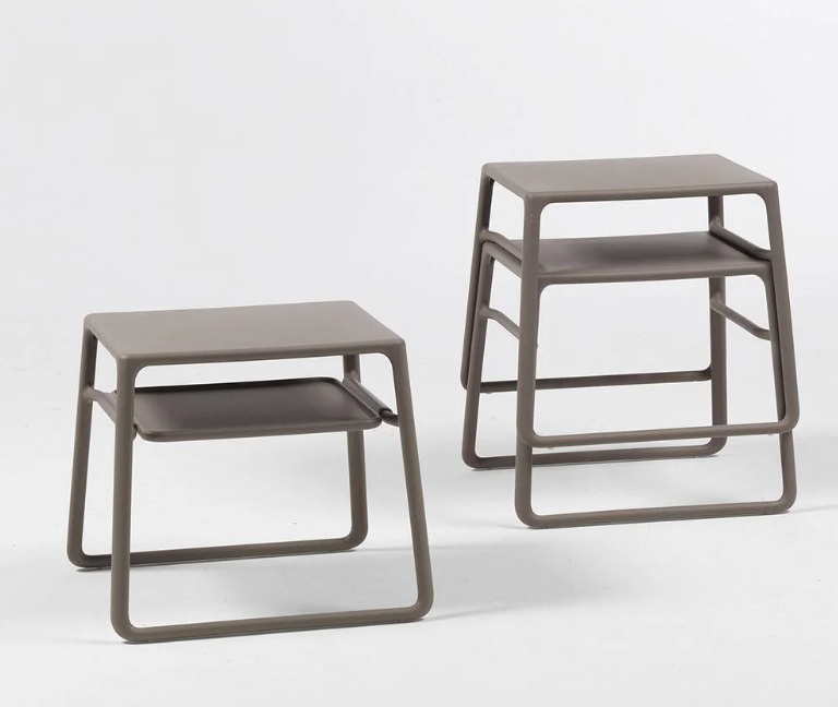 Stackable poolside side table designed for space-efficient storage